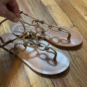 Schutz tan and gold sandals